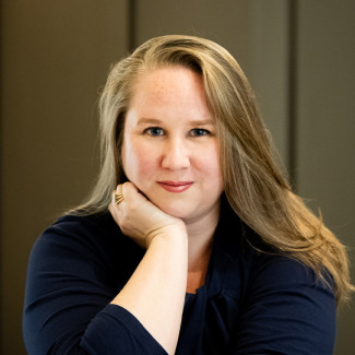 Courtney E. Thompson