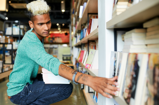 Guy Stocking Bookstore Shelf