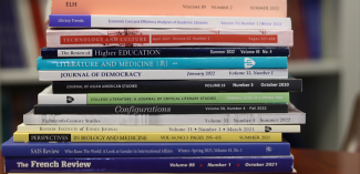 Stack of Hopkins Press Journals