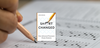 Person taking test with Shortchanged book cover