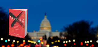 The book Wrong placed on a blurry background of the capitol building