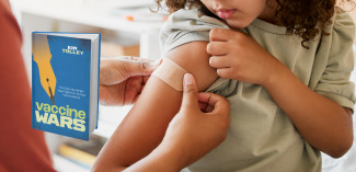 Child getting a vaccine with the cover of Vaccine Wars