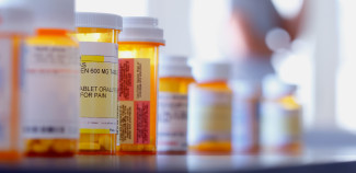 Pharmacy Table Top with pill bottles on it